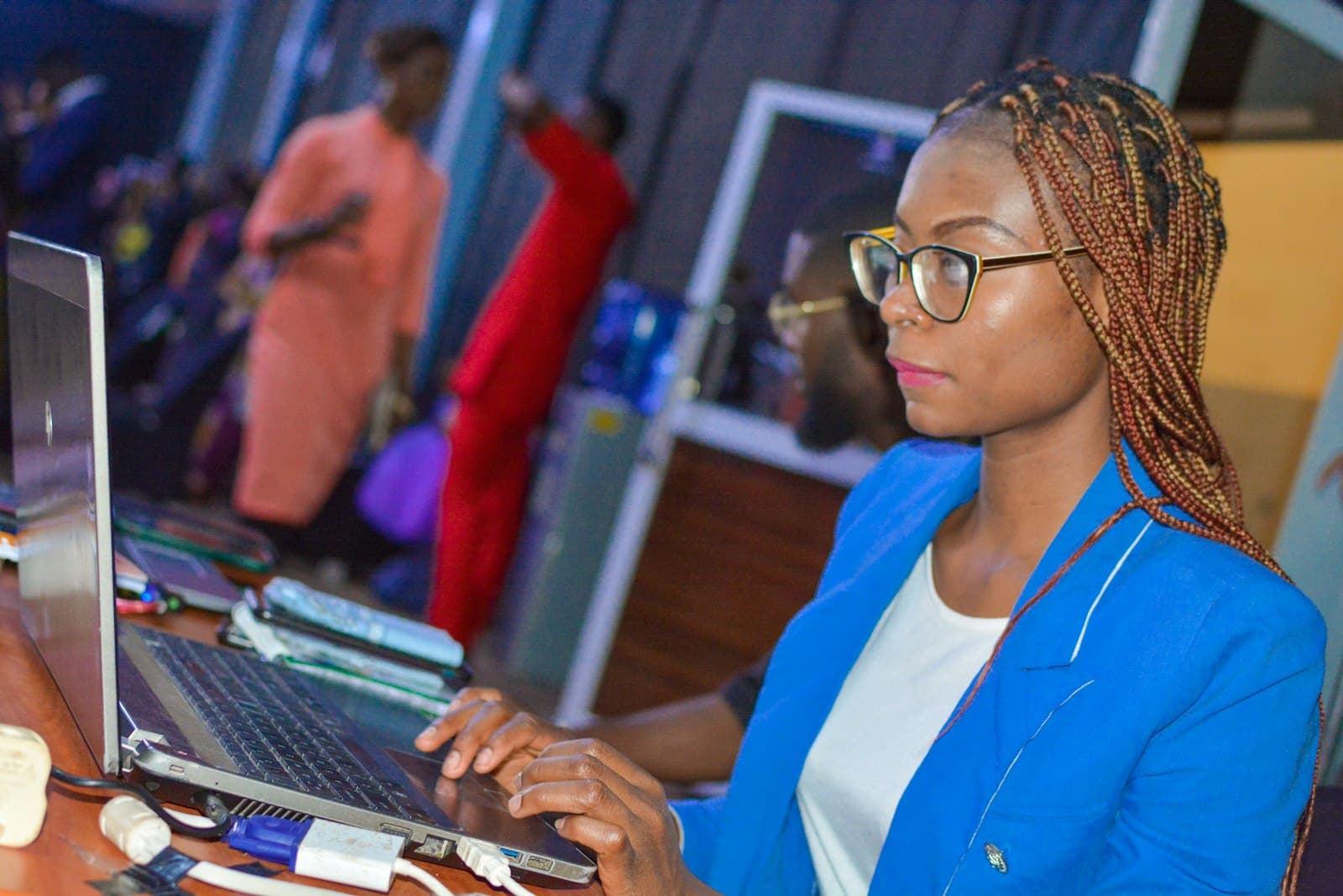 A learner studying data on her laptop